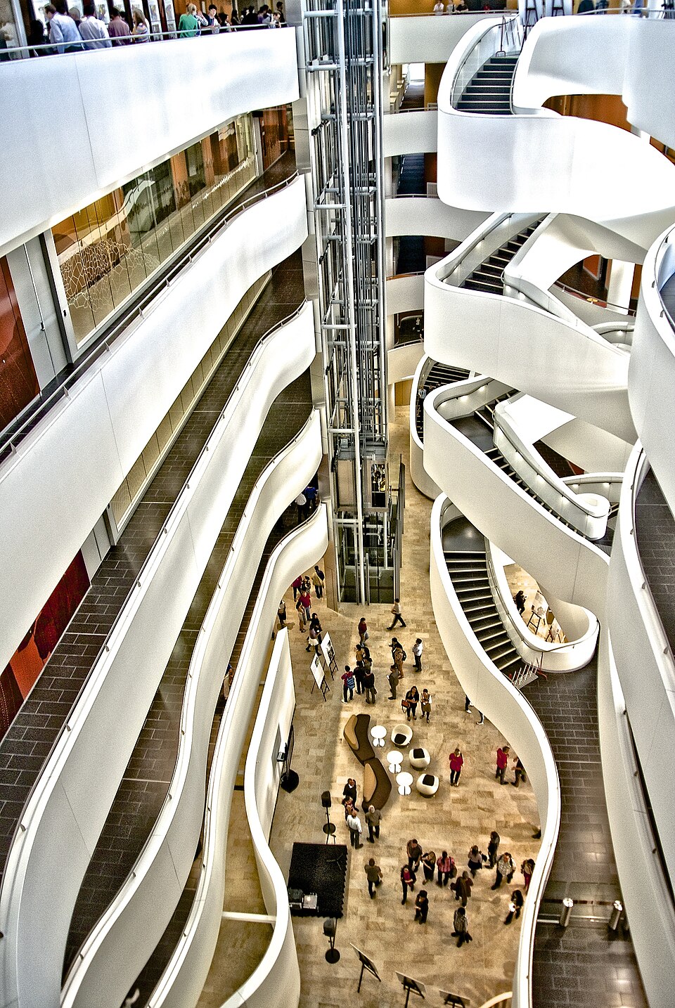 Charles Perkins Centre atrium at The University of Sydney, with sculptural white stairs and walkways