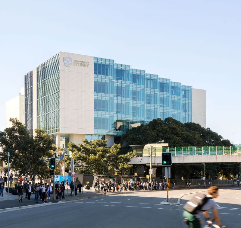 LEES1 Building at The University of Sydney, with a glass facade overlooking a busy street