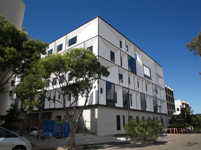 Sydney Children’s Hospital Extension exterior with white facades and landscaped street frontage